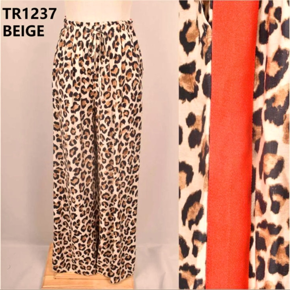✨RESTOCKED✨FROM PARIS FRANCE 🇫🇷 Leopard pants with red stripes down the sides. - Picture 5 of 5